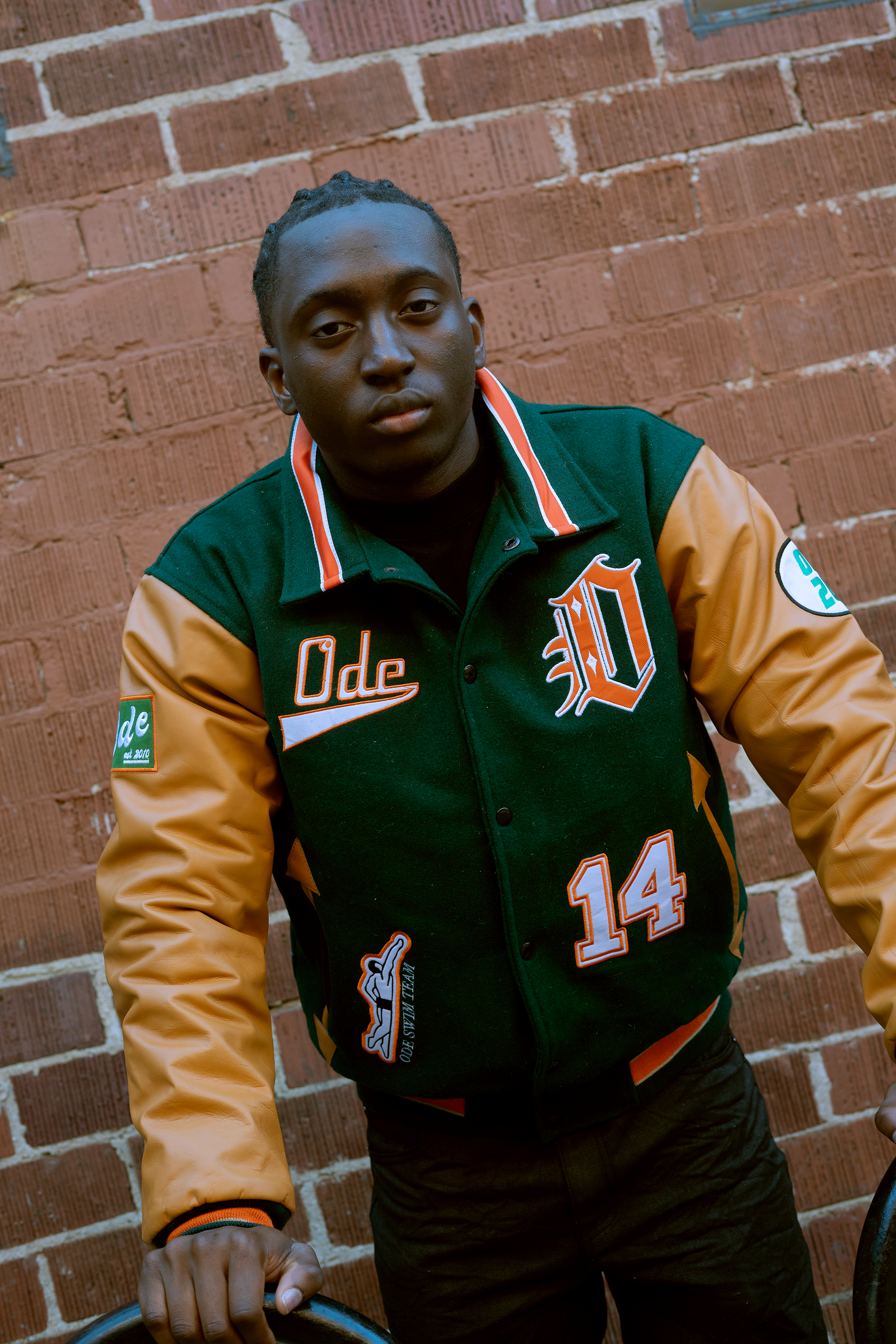 The ODE Swin Team Green & Orange Varsity Jacket